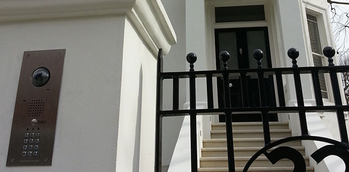 Large modern house behind security gates
